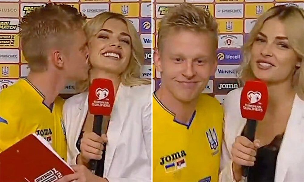 Zinchenko và vợ từng công khai hẹn hò trên sân trong một cuộc phỏng vấn. Ảnh: Cắt từ video